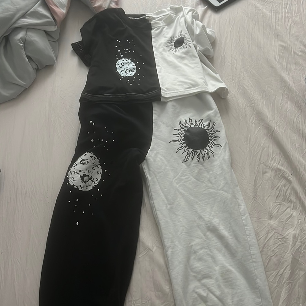 Black and white kid’s clothes size 11/12 badly used no stains